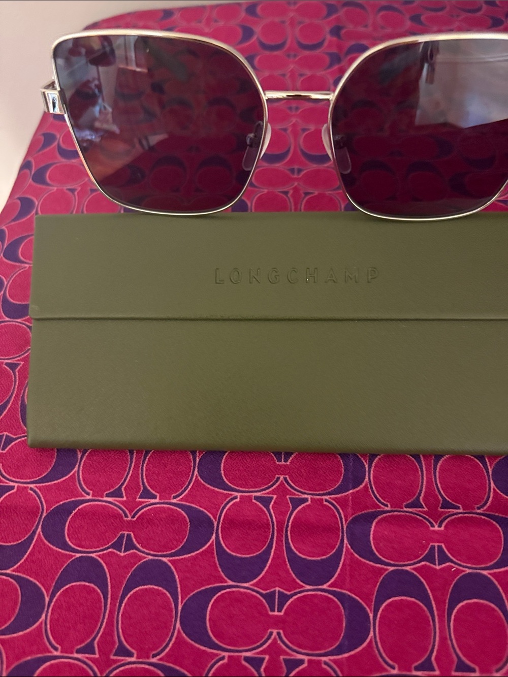 Longchamp Silver Frame Sunglasses with Pink Lenses